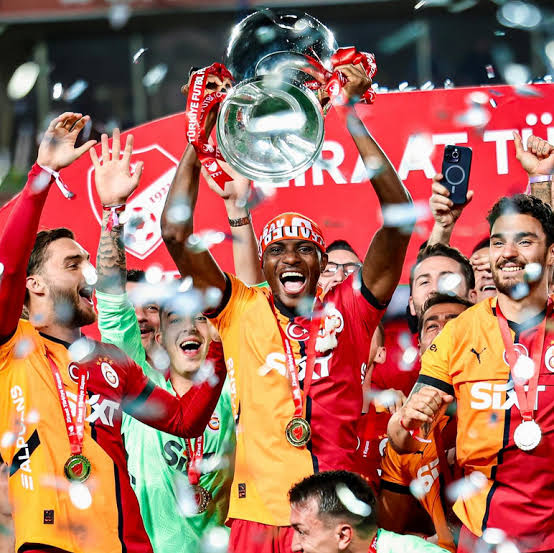 Victor Osimhen lifts the trophy high with his teammates as they their 4th Turkish trophy with Galatasaray — a moment of triumph and unity for the champions.
